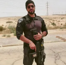 On October 7, Gvili was at home recovering from a broken shoulder (surgery scheduled soon after). Despite his injury, he heard reports of the Hamas attack, quickly put on his uniform, took a motorcycle, and rushed to defend Kibbutz Alumim (about 50 minutes from his home).  He fought for hours, reportedly saving dozens to ~100 civilians (including Nova music festival attendees fleeing the area) and killing around 14 terrorists before being overwhelmed. He was killed in battle; his body was abducted by Hamas.