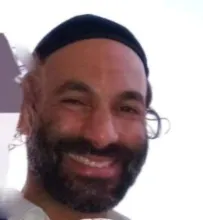 A resident of the Ramot neighborhood in Jerusalem, killed while waiting at the bus stop on his way to study at his kollel (study hall), his books still in his hands.